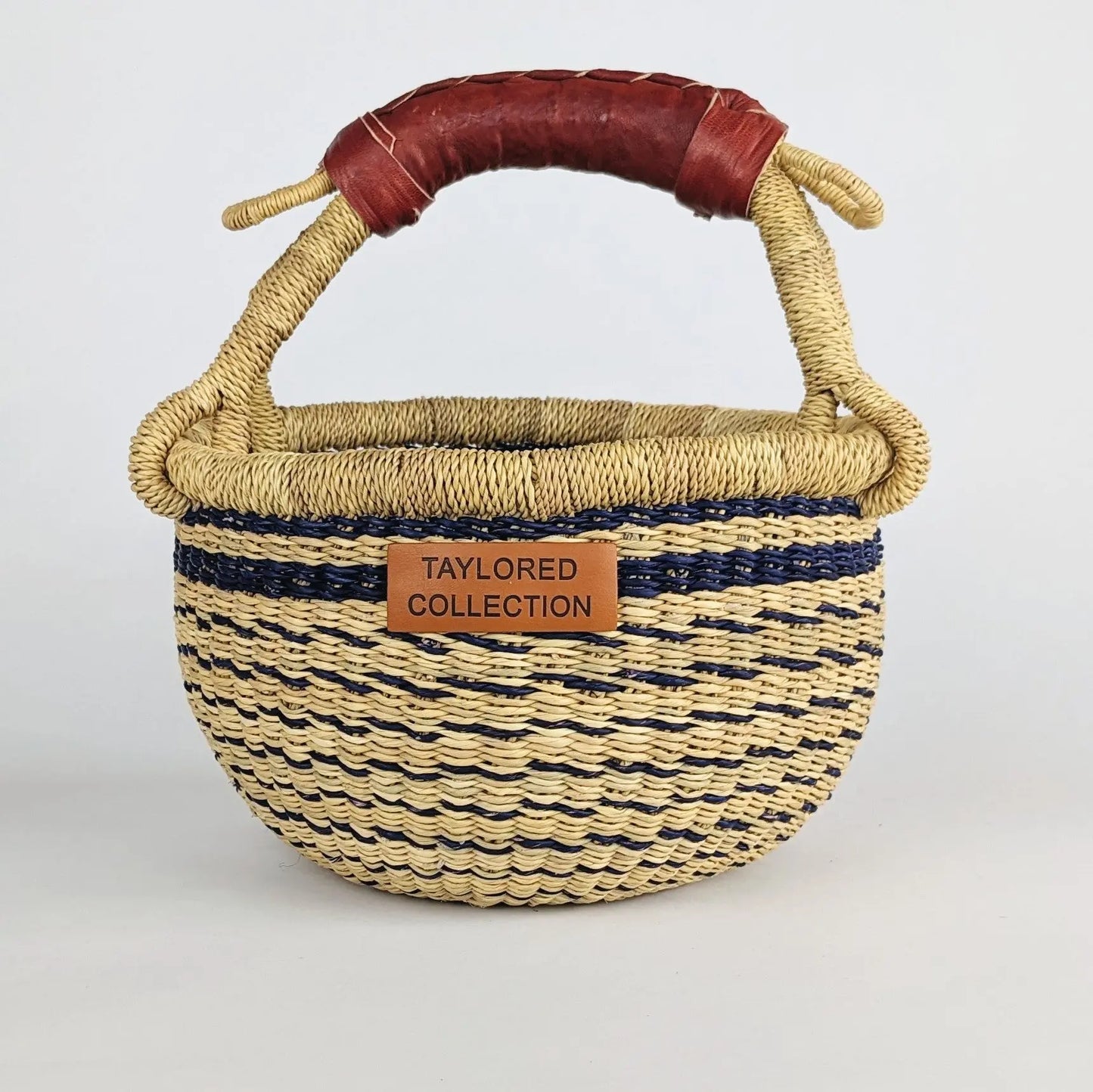 Flora Navy Petite Bolga Basket The Taylored Collection