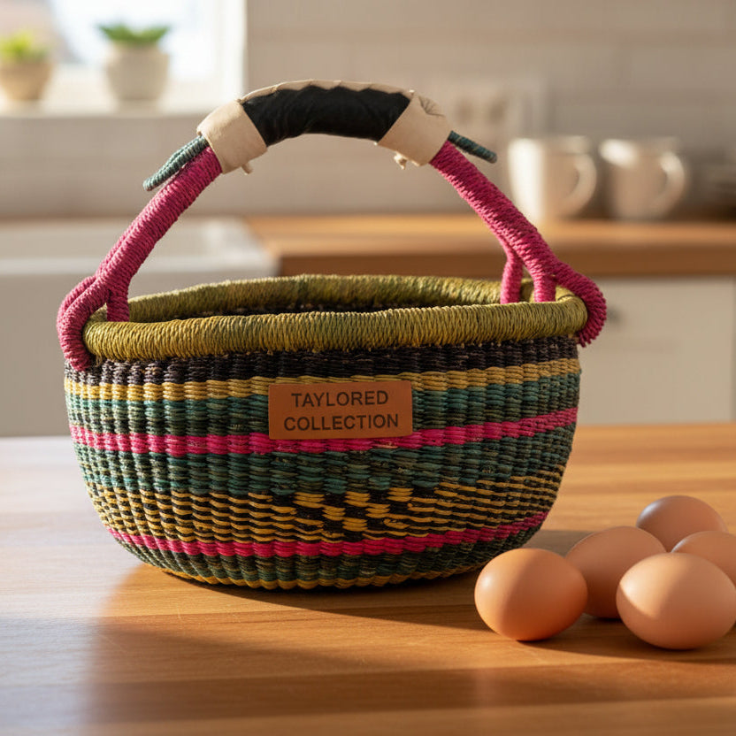 Woven basket with colorful handles on a wooden surface next to eggs